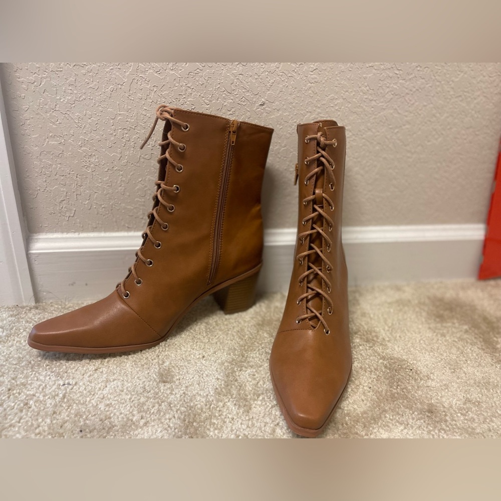 Size 11 combat boots. Never worn